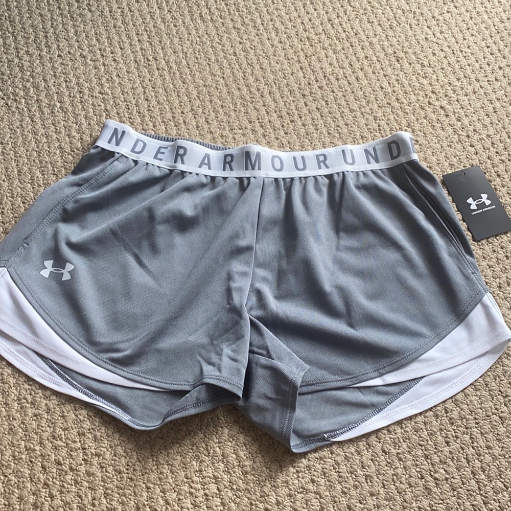 grey and white under armor shorts